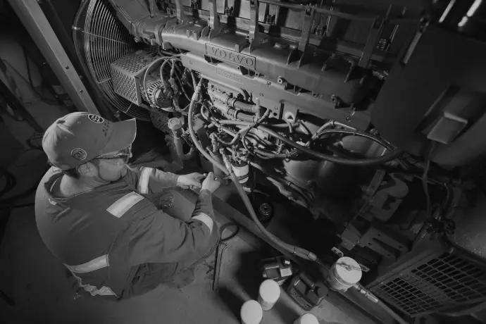 Technician Working on a Generator