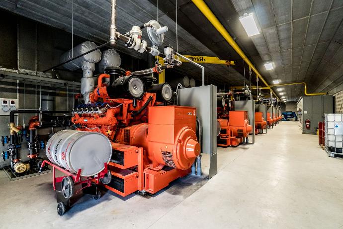 a line of continuous power generators, installed inside of a generator building